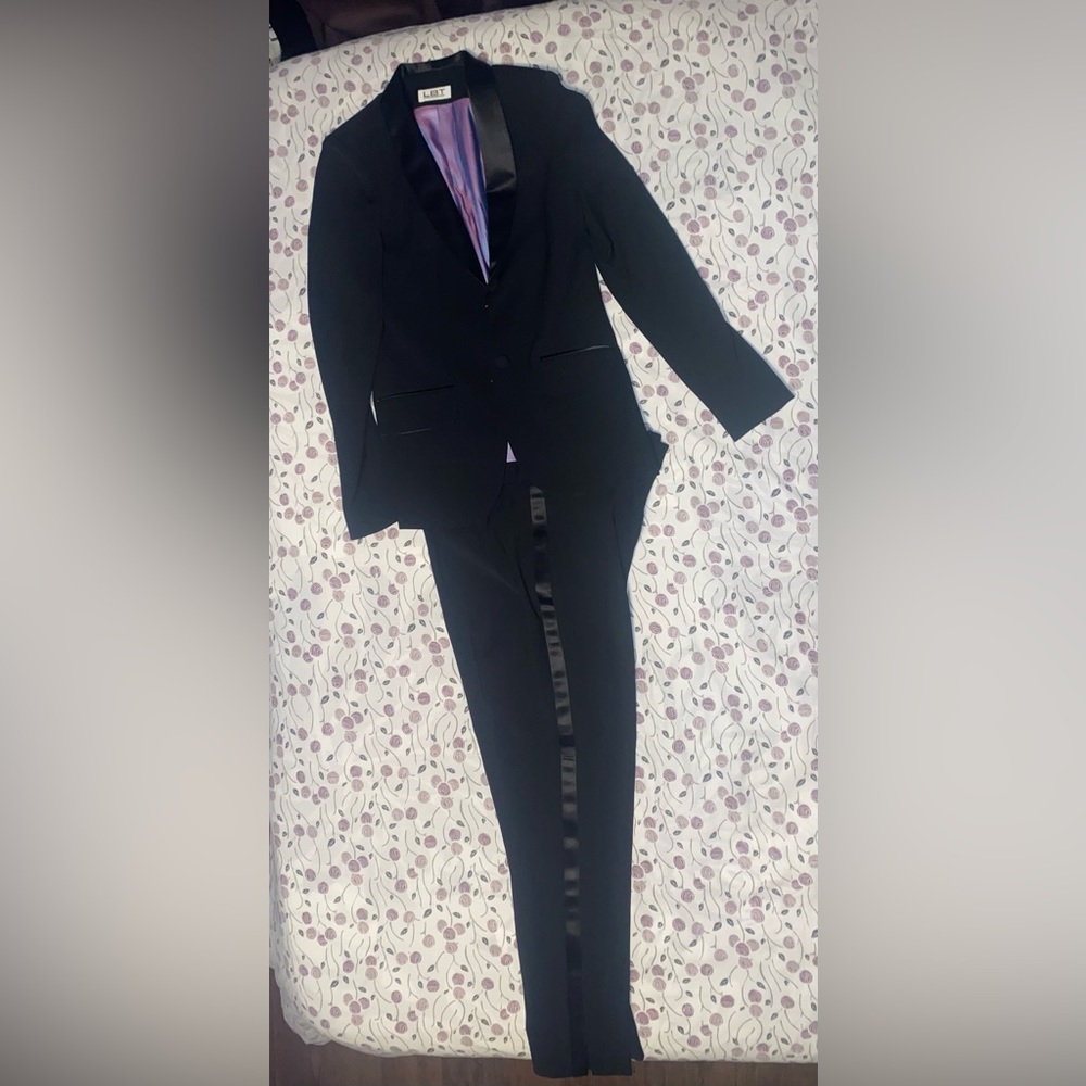 Little black tux suit, vest and bow tie.